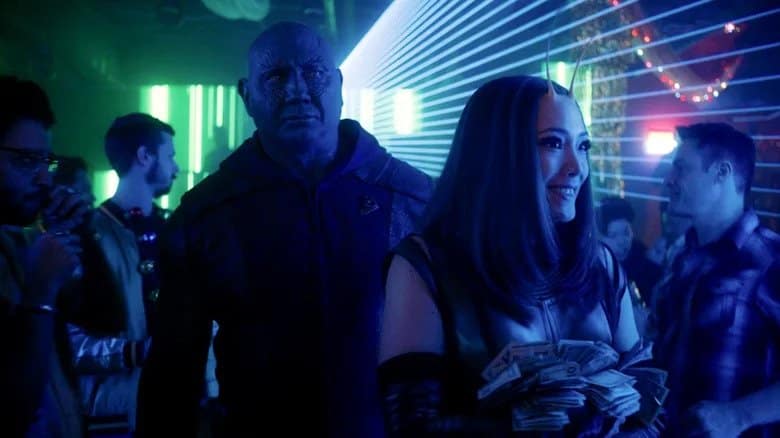 Two figures in a dimly lit club in Guardians of the Galaxy