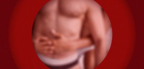 A blurred torso against a red background