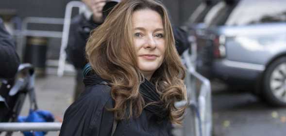 A photo shows education secretary Gillian Keegan wearing a black coat as she leaves Downing Street