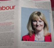 Photo of Rosie, smiling, wearing a red jacket, on a newspaper with the headline Labour