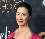 Photo of Actor Michelle Yeoh posing for the cameras at the Critics Choice Awards ceremony