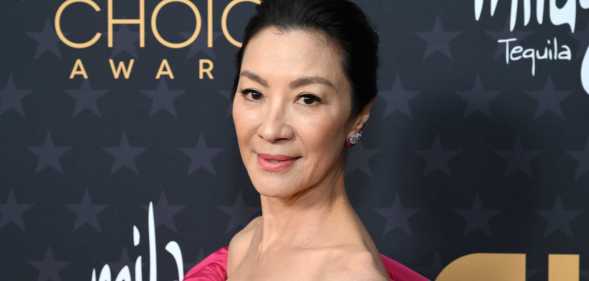 Photo of Actor Michelle Yeoh posing for the cameras at the Critics Choice Awards ceremony