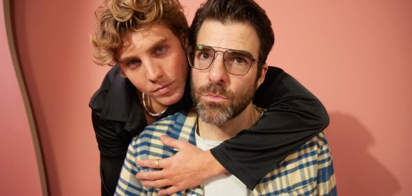 Lukas Gage puts his arm around Zachary Quinto while posing at the SXSW film festival.