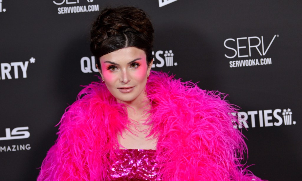TikTok star Dylan Mulvaney wears bold pink look at Queries 2023 awards. (Getty)