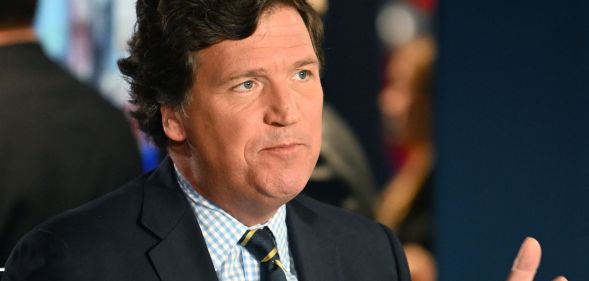 Tucker Carlson talking during a broadcast.