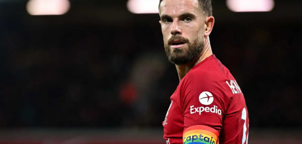 England footballer Jordan Henderson wears a red strip with a rainbow captain's armband