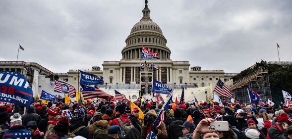 Pro-Trump supporters including members of neo-fascist group the Proud Boys storm the U.S. Capitol following a rally with President Donald Trump on January 6, 2021 in Washington, DC.