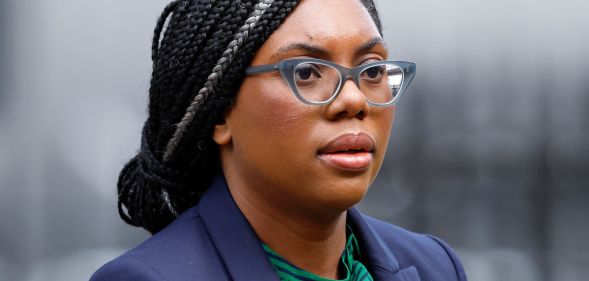 Kemi Badenoch walking near Number 10 Downing Street.