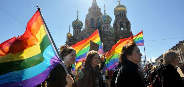 LGBTQ+ rights activists during a protest in St. Petersburg.