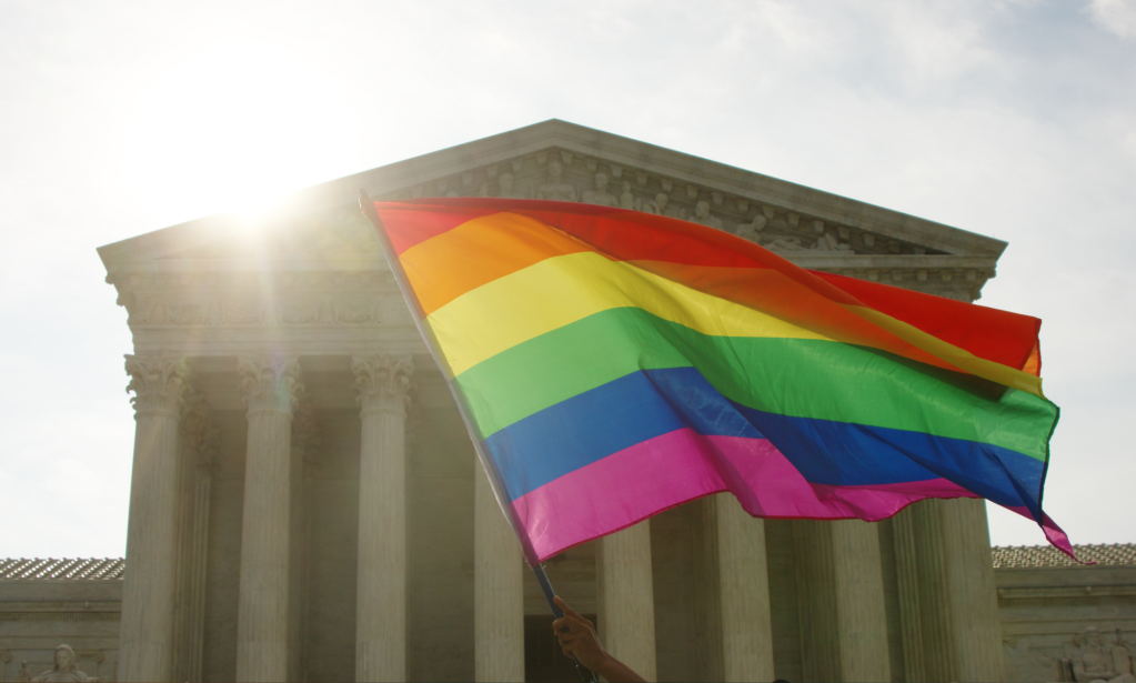 Pride flag waving in front of congress