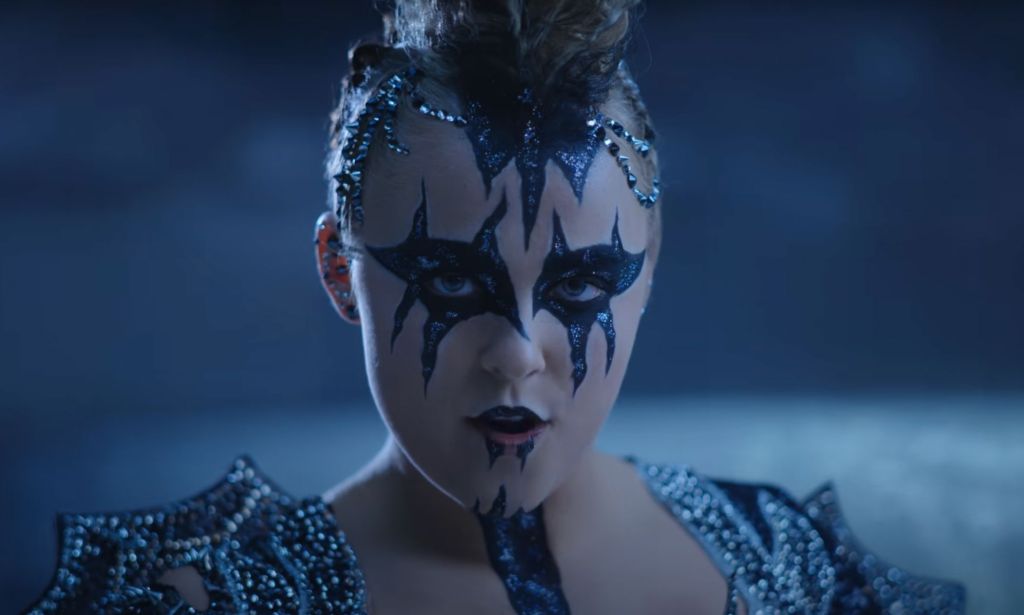 JoJo Siwa in KISS-inspired makeup for the Karma music video.