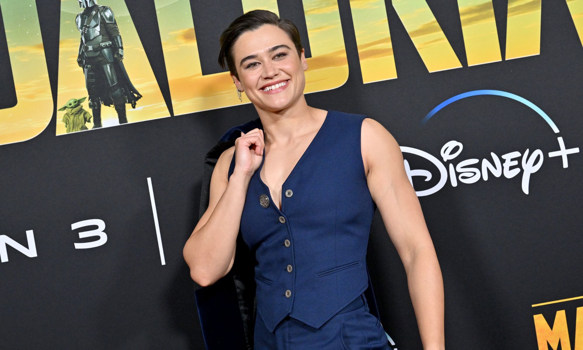 Katy O'Brien in a waistcoat at The Mandalorian premiere.