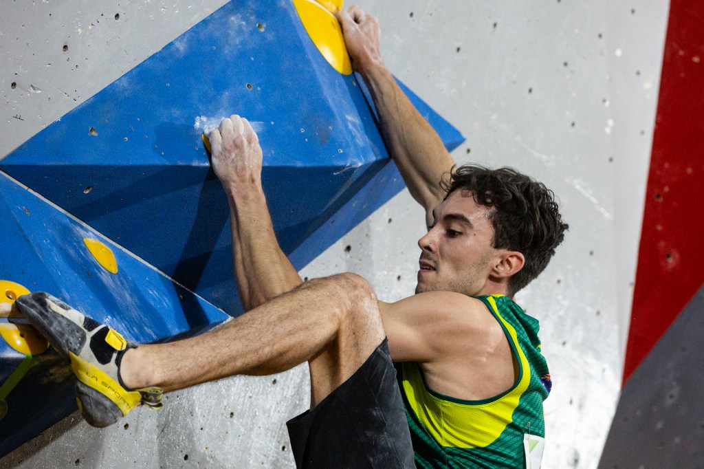 Campbell Harrison of Australia is seen competing in the Boulder during the Sport Climbing Olympic Qualifications.