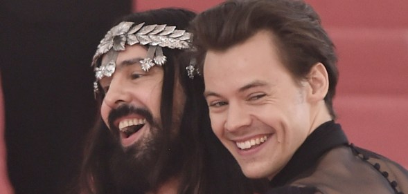 Harry Styles and Alessandro Michele hugging and laughing at the Met Gala