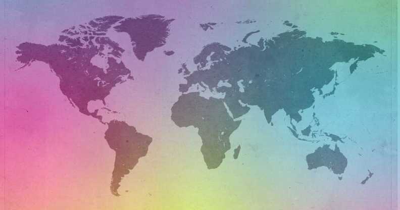 a global map in a rainbow hue