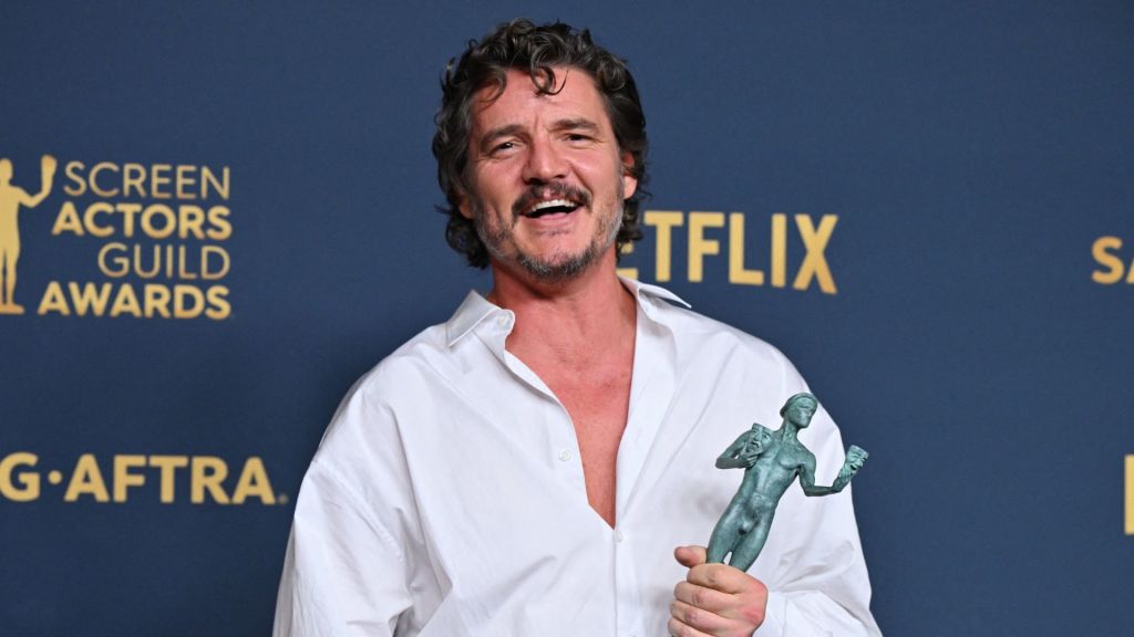 Chilean-US actor Pedro Pascal poses in the press room with the award for Outstanding Performance by a Male Actor in a Drama Series for "The Last of Us" during the 30th Annual Screen Actors Guild awards at the Shrine Auditorium in Los Angeles, February 24, 2024.