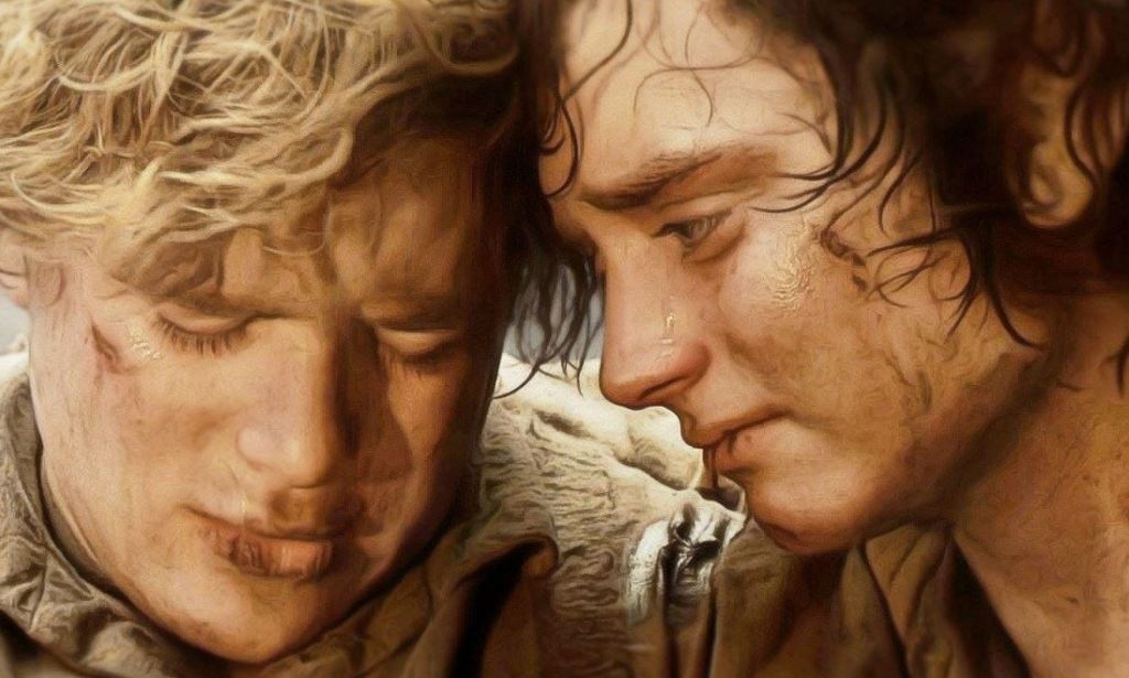 Sam and Frodo from Lord of the Rings resting against each other.