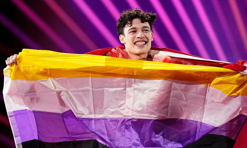 Eurovision Song Contest winner Nemo with their non-binary flag.