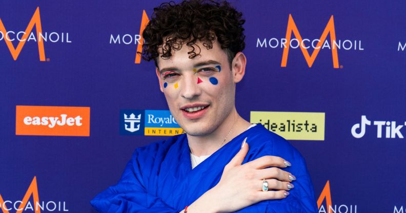 Eurovision star and Switzerland's entrant Nemo poses on the red carpet.