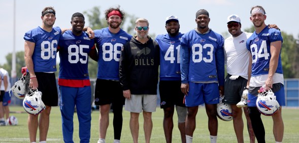 Buffalo Bills players and coaches pose for a photo