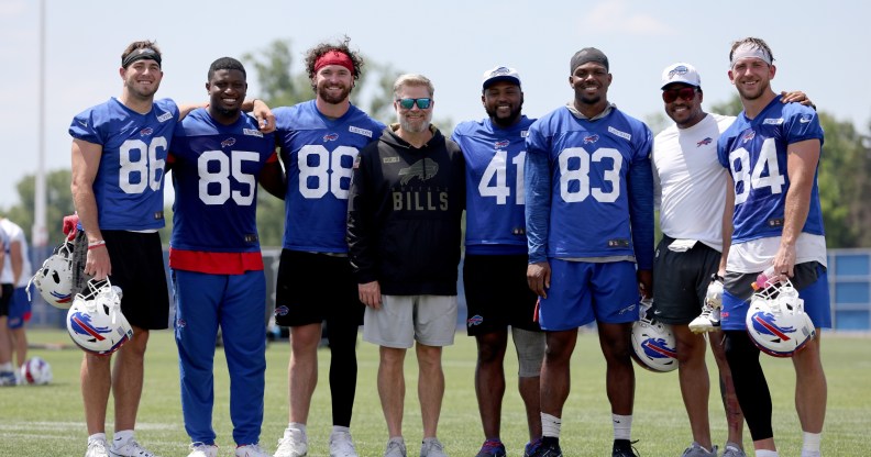 Buffalo Bills players and coaches pose for a photo