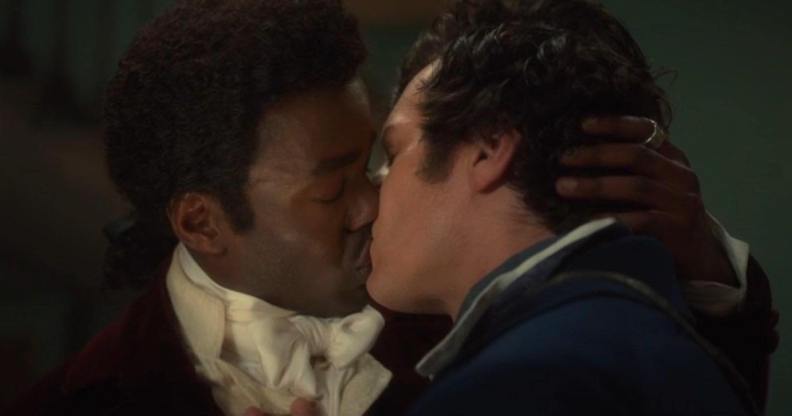 Doctor Who'a Ncuti Gatwa (left) shares a kiss with Jonathan Groff's Rogue (right)