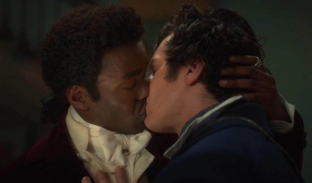 Doctor Who'a Ncuti Gatwa (left) shares a kiss with Jonathan Groff's Rogue (right)