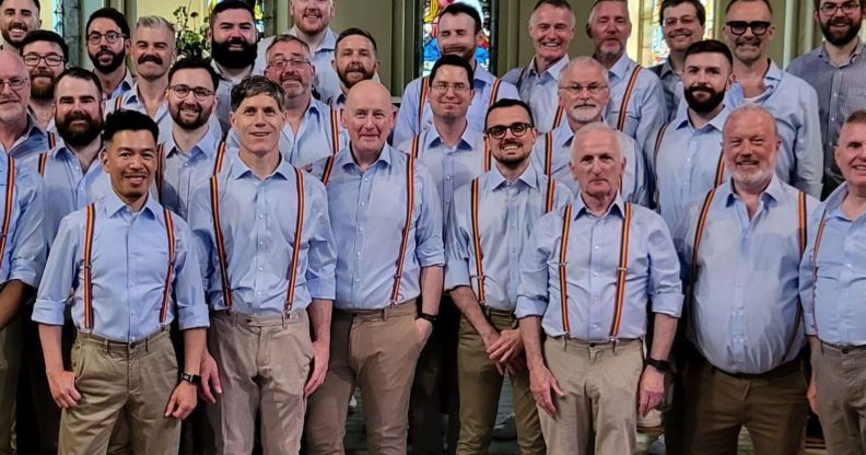 Dublin Gay Men's Chorus photographed wearing rainbow suspenders.