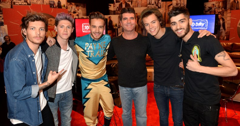 Simon Cowell (centre) has launched a new campaign to find a new boy band, like One Direction (pictured in 2013). (Getty)