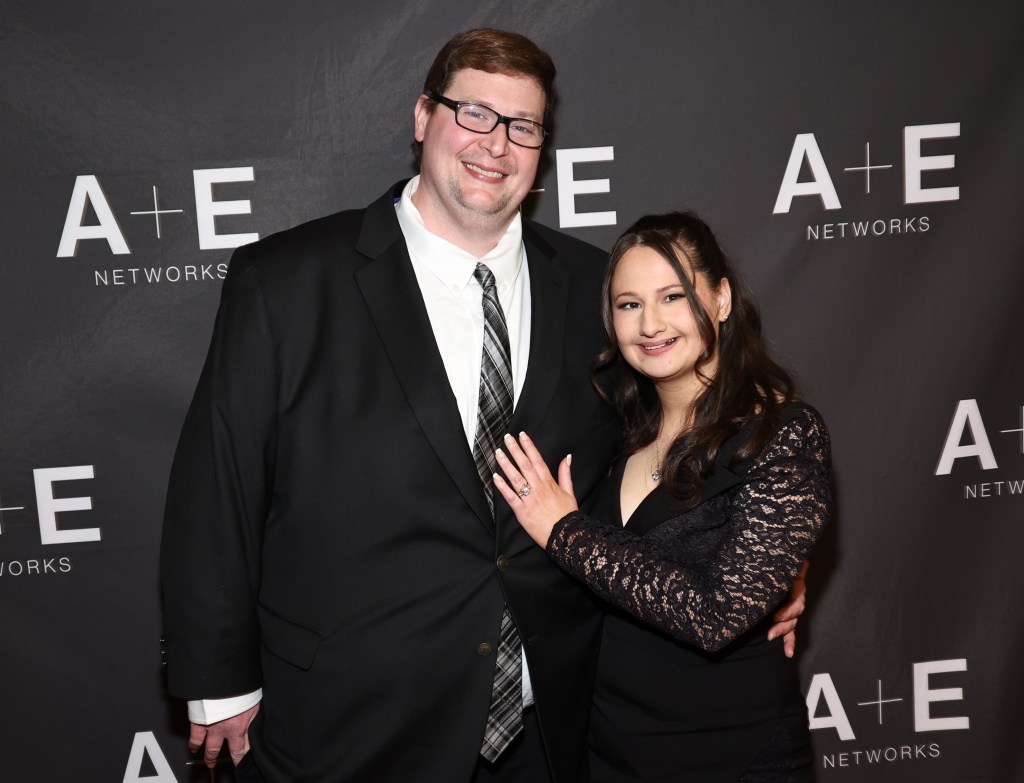 Ryan Anderson and Gypsy Rose Blanchard on a red carpet.