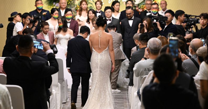 Ten LGBTQ+ couples stage mass wedding in Hong Kong despite same-sex marriage being illegal