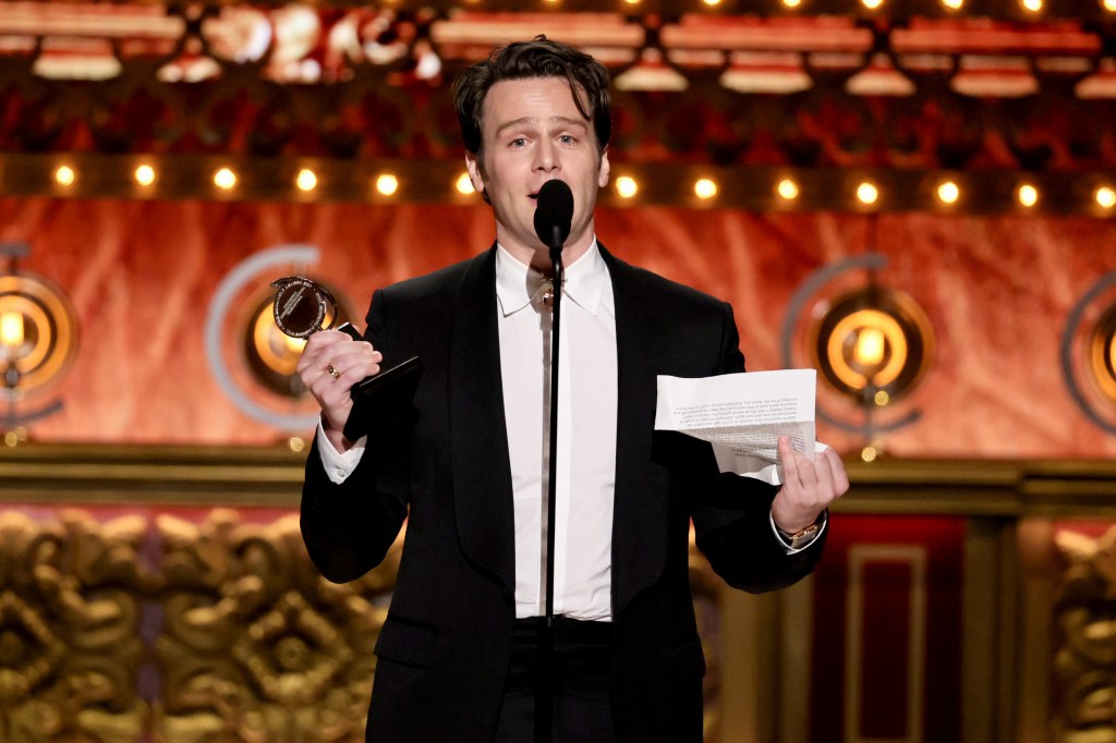 Jonathan Groff on stage accepting his Tony Award