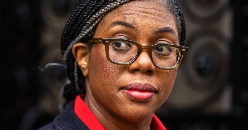 Kemi Badenoch walking past Number 10 Downing Street.