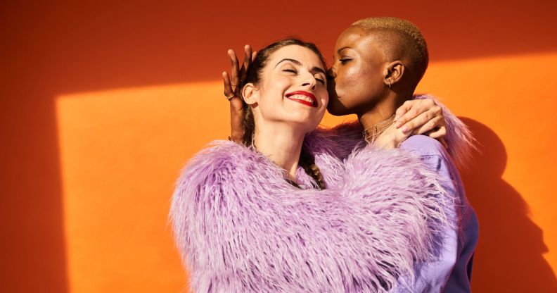 Bright, colourful image of an LGBTQ+ couple