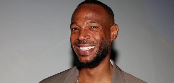 Marlon Wayans attends his screening of Good Grief, smiling at the camera.