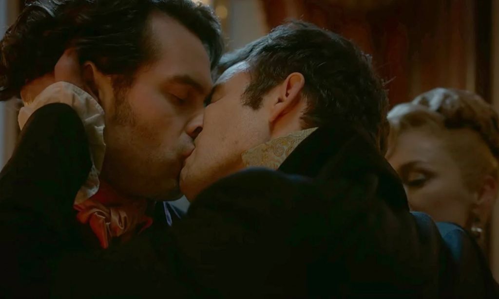 Paul Suarez and Benedict Bridgerton kiss.
