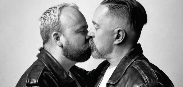 Two men kissing in Pride in London's 2024 campaign