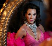 Countess Luann in silver necklace, pink dress and boa