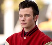 Glee's Chris Colfer in an episode, wearing a baseball jacket