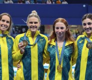 Emma McKeon, Shayna Jack, Mollie O'Callaghan and Meg Harris of team Australia celebrate gold medal at the end of Women's 4x100m freestyle relay.