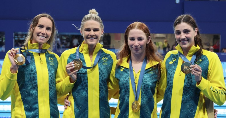 Emma McKeon, Shayna Jack, Mollie O'Callaghan and Meg Harris of team Australia celebrate gold medal at the end of Women's 4x100m freestyle relay.