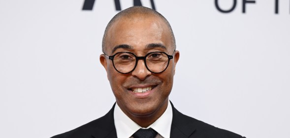 Colin Jackson at the BBC Sports Personality Of The Year 2023, wearing a suit and smiling at the camera.
