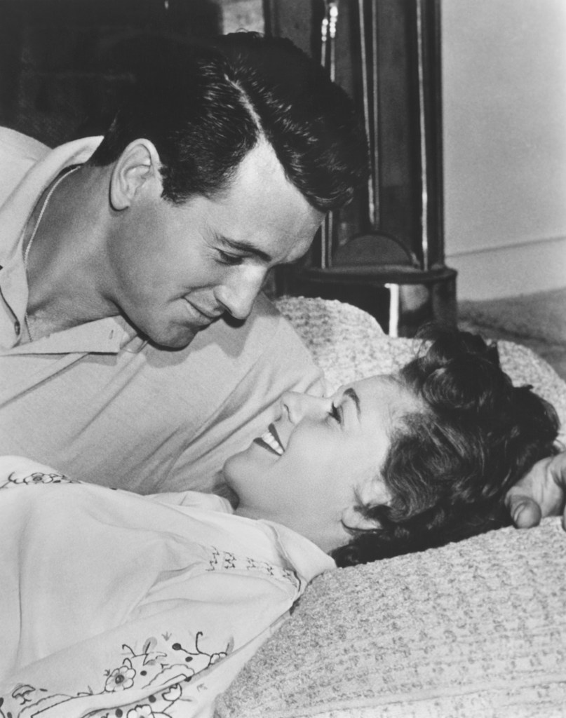 Rock Hudson in a romantic pose with wife Phyllis Gates