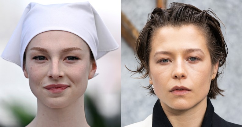 Hunter Schafer wearing a white hat over her hair and Emma D’Arcy wearing a black and white suit at a premiere.