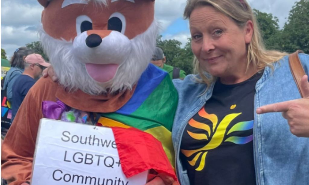 Holly Greenberry-Pullen stood with a supporter dressed in a fox costume