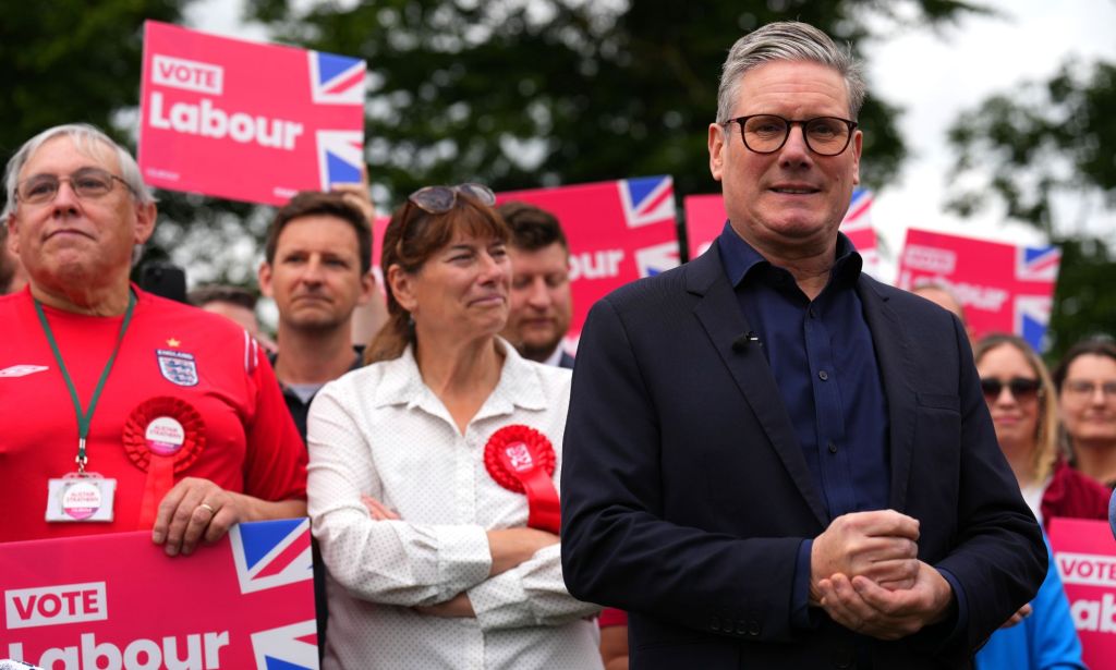 Keir Starmer surrounded by supporters.