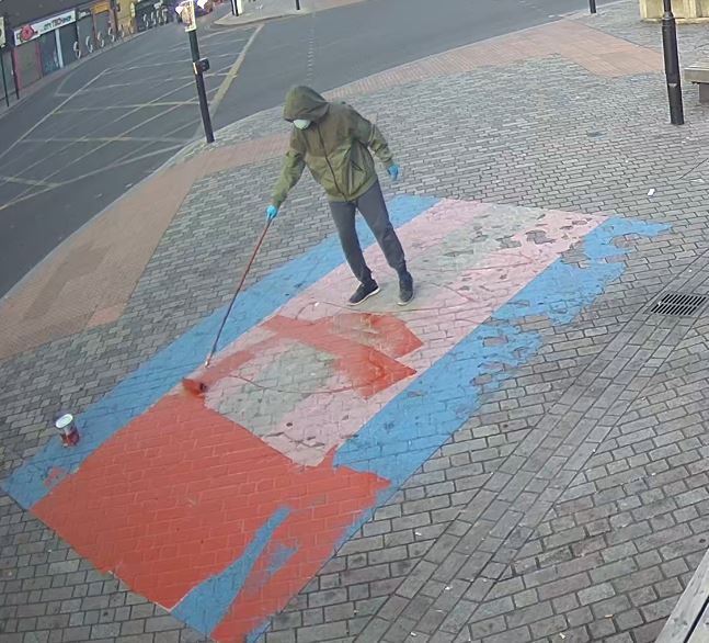 CCTV footage of person vandalising Pride flags