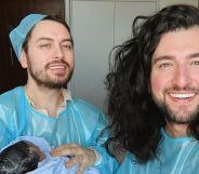 Brian Dowling (left) and Arthur Gourounlian (right) with their new baby