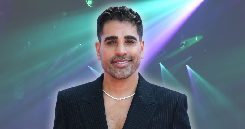 Dr Ranj Singh against purple and blue spotlights