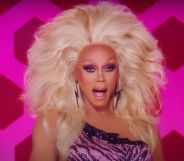 RuPaul on the drag race judging panel looking shocked and gagged.